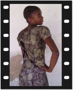 Back womens dress Back side of womens dress - Designed, coloured and made at Moyo Mmoja Vocational Training Centre